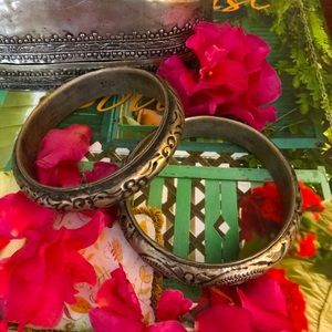 Vintage Moroccan bangle set. They make a noise.